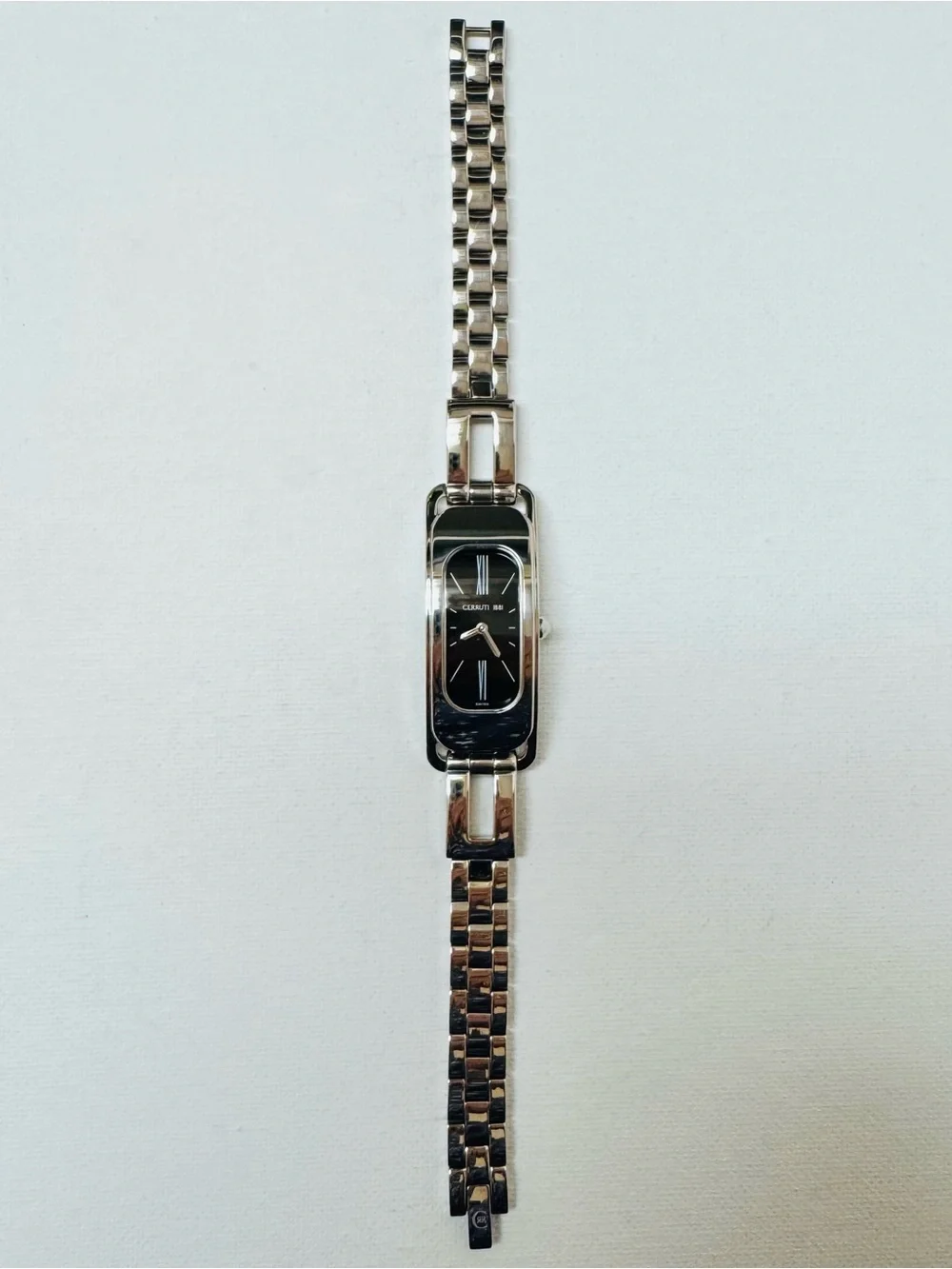 Cerruti 1881 C Wave Black Dial Women's Silver Curved Tank Bracelet Watch 61202